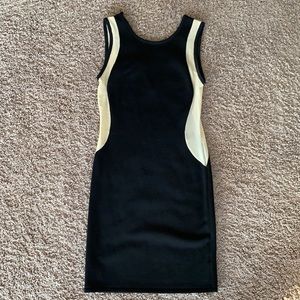 Black Akira mini dress with sheer side detail